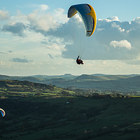 Buy canvas prints of Paragliders over the Dove Valley by James Grant