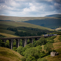 Buy canvas prints of Train crossing viaduct by Paul Davis
