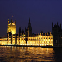 Buy canvas prints of The Houses Of Parliment At Night by kelly Draper