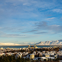 Buy canvas prints of Ice and Fire: Reykjavik Panorama by Stuart Jack