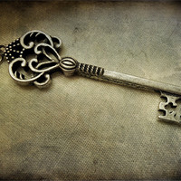 Buy canvas prints of antique silver key by Heather Newton