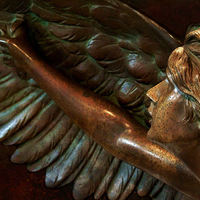 Buy canvas prints of bronze angel by Heather Newton