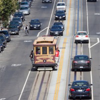 Buy canvas prints of San Francisco street view with trolley car by Craig Lapsley