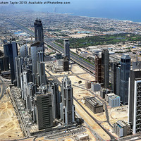 Buy canvas prints of Dubais Majestic Skyscrapers by Graham Taylor