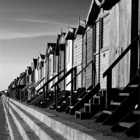 Buy canvas prints of Frinton on Sea Beach Huts by Darren Burroughs