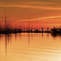 Buy canvas prints of Tall Ships At Dawn by Darren Burroughs