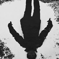 Buy canvas prints of Girl In A Puddle by Darren Burroughs