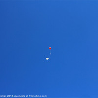 Buy canvas prints of Red and White Balloons in Blue Sky by Mark Purches
