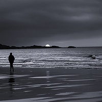 Buy canvas prints of Silhouette of Man Walking Alone on Beach Sunset by Mark Purches