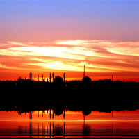 Buy canvas prints of Sunset over Southampton oil terminal by Doug McRae