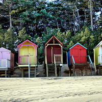 Buy canvas prints of Brightly Coloured Beach Huts by Sandi-Cockayne ADPS