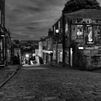 Buy canvas prints of A Sinister Howarth High Street by Sandi-Cockayne ADPS