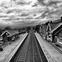 Buy canvas prints of Settle Railway Station in Mono by Sandi-Cockayne ADPS