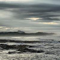 Buy canvas prints of Storm Brewing Over Bamburgh Castle by Sandi-Cockayne ADPS