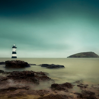 Buy canvas prints of  Penmon Lighthouse, Anglesey, Wales by Jennifer Mannion