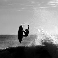 Buy canvas prints of Silhouetted Surfer at Dawn by peter tachauer