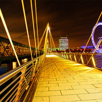 Buy canvas prints of Hungerford Bridge & London Eye at Night by peter tachauer