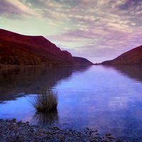 Buy canvas prints of  Still Mountain Waters by Chris Manfield
