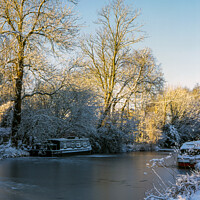 Buy canvas prints of Frozen river at  Aldermaston Wharf  by Jim Hellier