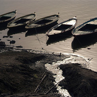 Buy canvas prints of Boats in the Ganges, Varanasi, Utter Pradesh, Indi by Serena Bowles