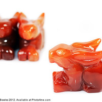 Buy canvas prints of Red Agate Carved Rabbits by Serena Bowles