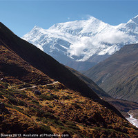 Buy canvas prints of Snowy Mountain and Valley along Annapurna Circuit by Serena Bowles