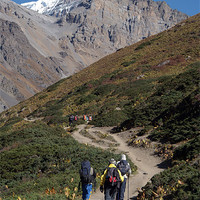 Buy canvas prints of Trekkers on the Annapurna Circuit by Serena Bowles