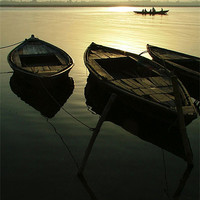 Buy canvas prints of Boats on the River Ganges, Varanasi, Uttar Pradesh by Serena Bowles