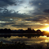 Buy canvas prints of Sunset on the River Kwai, Kanchanaburi, Thailand by Serena Bowles