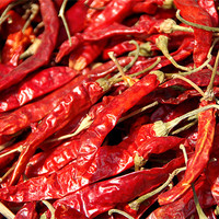 Buy canvas prints of Red Chillies Drying in Kathmandu by Serena Bowles