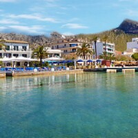 Buy canvas prints of Puerto Pollensa Panoramic  by Louise Godwin