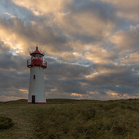 Buy canvas prints of Dramatic sky over lighthouse by Thomas Schaeffer