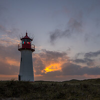 Buy canvas prints of Dramatic sky at the lighthouse by Thomas Schaeffer