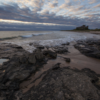 Buy canvas prints of Sunrise at Bamburgh castle by Thomas Schaeffer