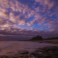 Buy canvas prints of Sunrise at Bamburgh castle by Thomas Schaeffer