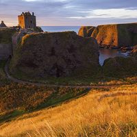 Buy canvas prints of Dunnottar Castle at Sunrise by Thomas Schaeffer