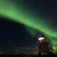 Buy canvas prints of Aurora Borealis at the lighthouse by Thomas Schaeffer