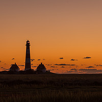 Buy canvas prints of Westerhever lighthouse sunset by Thomas Schaeffer