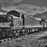 Buy canvas prints of  Kyle Of Lochalsh Station Class 37 Diesel by Simon Litchfield
