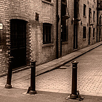 Buy canvas prints of Shad Thames (Sepia) by Joyce Storey