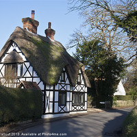 Buy canvas prints of English Thatched Cottage by Danny Callcut