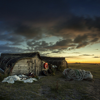 Buy canvas prints of  Lindisfarne Fisherman Huts by Paul Appleby