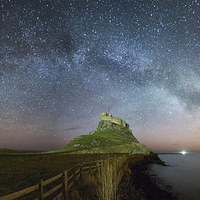 Buy canvas prints of  Lindisfarne under the Milky Way by Paul Appleby