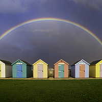 Buy canvas prints of Amble Rainbow Beach Huts by Paul Appleby
