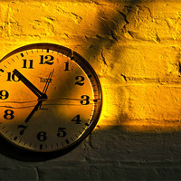 Buy canvas prints of Morning Sun Against The Clock by Daniel Cowee
