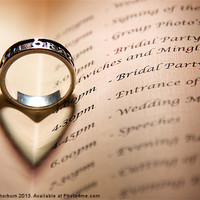 Buy canvas prints of Wedding Ring on Book by Keith Thorburn EFIAP/b