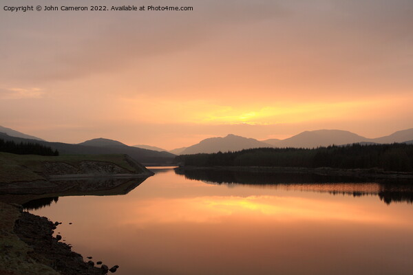 Sunrise at Laggan Dam in the Scottish Highlands. Picture Board by John Cameron