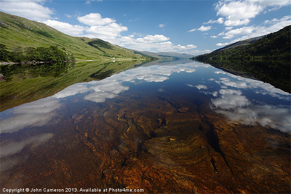 Still clear waters of Loch Arkaig. Picture Board by John Cameron