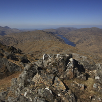 Buy canvas prints of On the Summit of Sgurr na Utha. by John Cameron