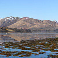 Buy canvas prints of Loch Eil on a bright spring morning. by John Cameron